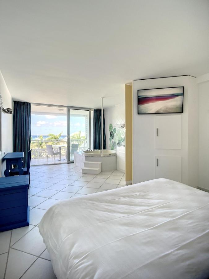 Le Domaine Anse Marcel Beach Resort Bagian luar foto