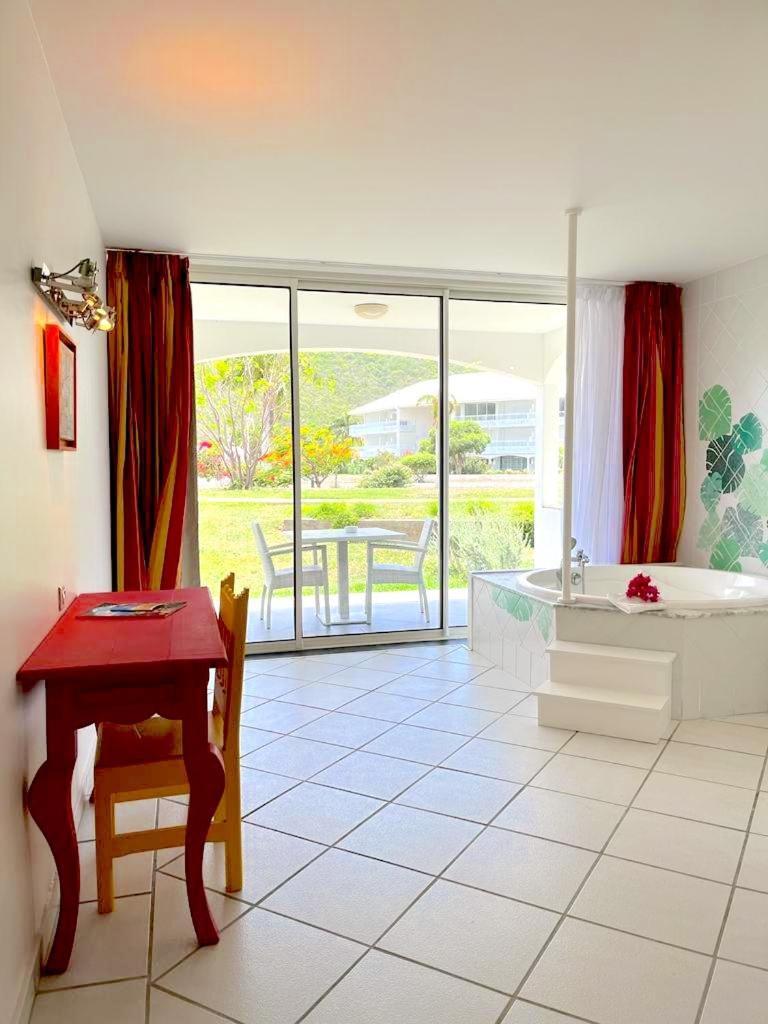 Le Domaine Anse Marcel Beach Resort Bagian luar foto