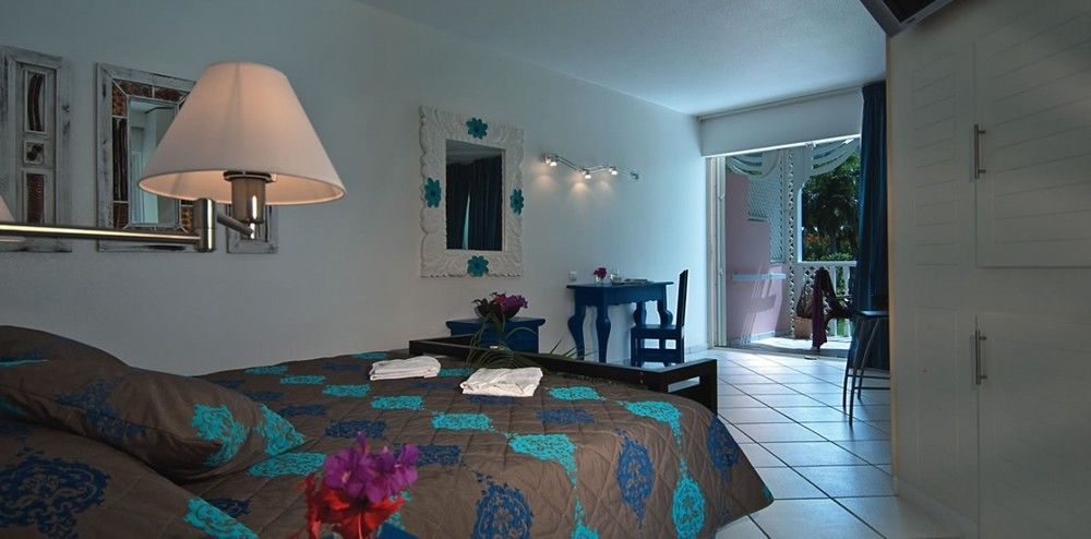 Le Domaine Anse Marcel Beach Resort Bagian luar foto